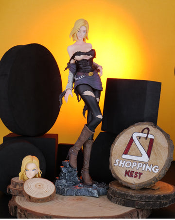 DBZ ANDROID 18 Figurine on a wooden stand with 'Shopping Nest' logo in the background