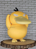 Psyduck action figure in right side face look 