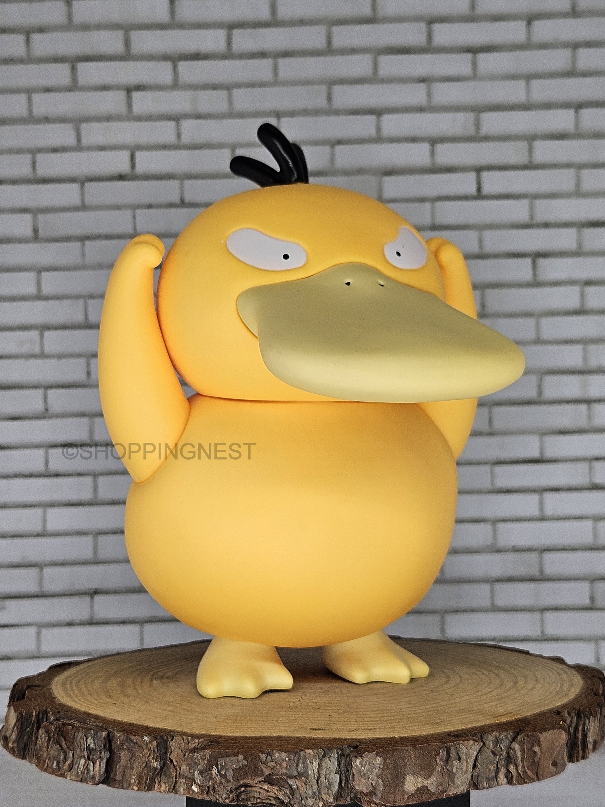 Psyduck action figure in right side face look 