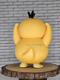 Psyduck action figure in back side look 