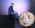 Suguru Geto right side image sitting on black box 